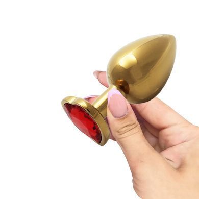 Металева анальна пробка Ouch! Heart Gem M золотиста з червоним кристалом 8,2 см - основне фото