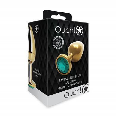 Металева анальна пробка Ouch! Round Gem M золотиста із зеленим кристалом 8,2 см - основне фото